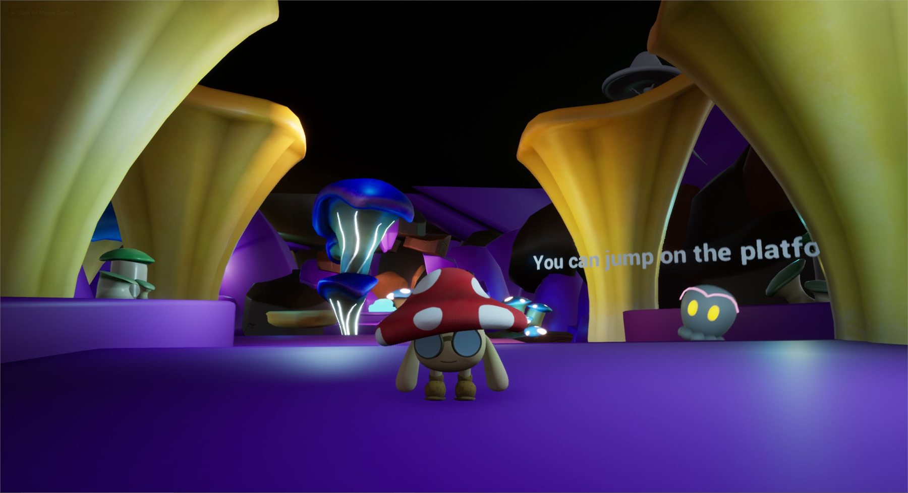 A cave platform with an on-screen prompt telling the player they can jump